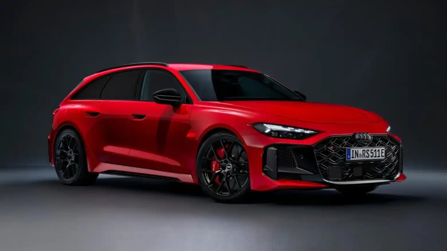 2026 Audi RS5 plug-in hybrid performance sedan with wide body styling and Quattro all-wheel drive