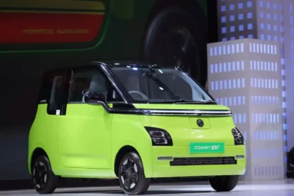 MG Comet EV compact electric car parked in urban city street showing futuristic design and small footprint mobility solution