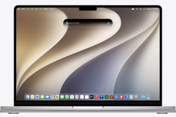 Apple MacBook displaying the macOS 27 Public Beta 2 update screen.