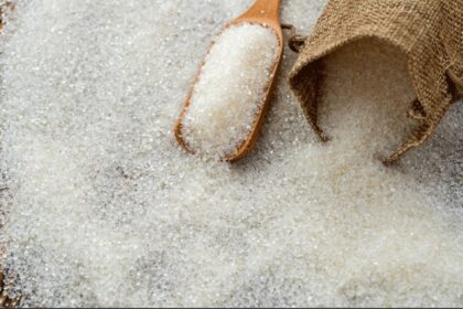 Sugar displayed for sale in an Indian retail market amid rising sugar prices above Rs 60 per kg